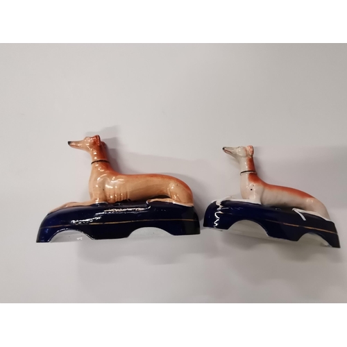 197 - Antique Staffordshire China Greyhound pen holders x2