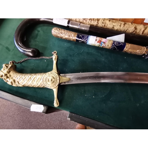 520 - A Georgian Regimental Bandsman's Sword, Royal Scots Fusiliers, with curved blade and brass scabbard,... 