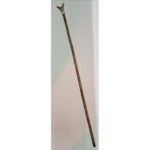 524 - An antler handle walking thumb stick/staff, capped with black horn, metal ferrule to bottom. 154.5cm... 