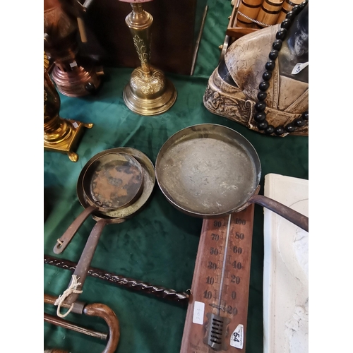 564 - A graduated set of three copper skillets, early 20th Century, the larger two pans stamped 'W.M. STIL... 