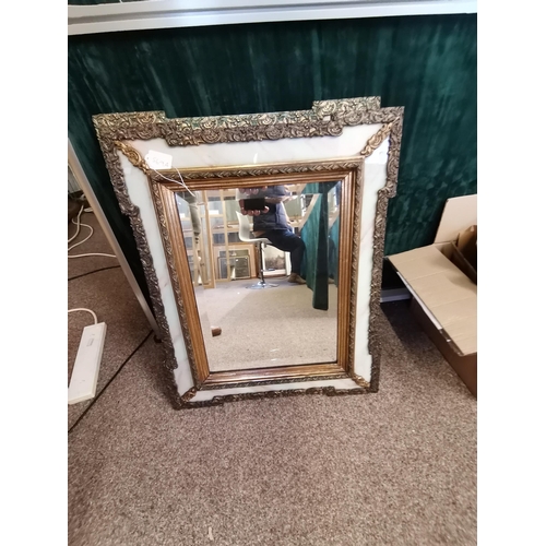 569A - A pair of gilt and marble effect wall mirrors. (2) 60cm by 50cm