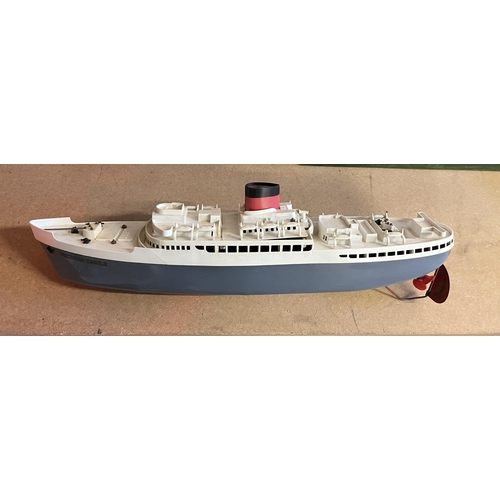 759 - A Tri-ang Ocean Liner model, 'R.M.S. Pretoria Castle', clockwork powered, in original box; together ... 