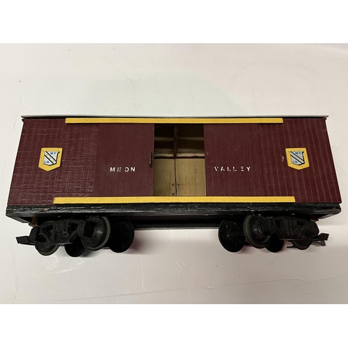 796 - Five wooden model Meon Valley railway carriages, in maroon and yellow livery. (5) Largest 50cm long