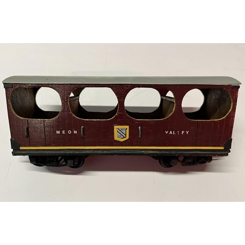 796 - Five wooden model Meon Valley railway carriages, in maroon and yellow livery. (5) Largest 50cm long