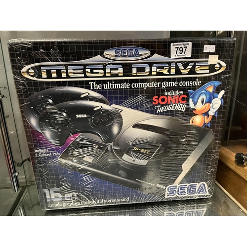 797 - K2 A SEGA Mega Drive 16-BIT games console and Mega Stick, 1980's factory sealed each boxed. (2)