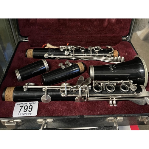 799 - A Selmer 'CL300' clarinet, cased; together with four music books for beginners. (5)