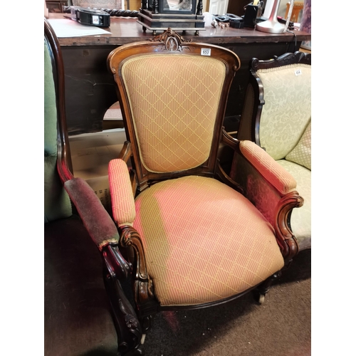 653 - A Victorian mahogany arm chair