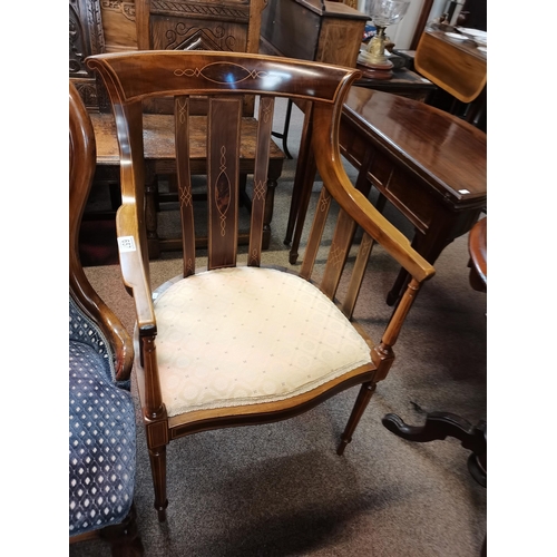 657 - An Edwardian inlaid armchair