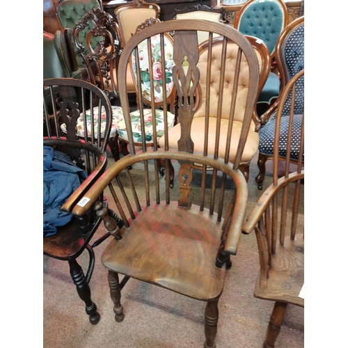 665 - A Windsor high back chair in elm