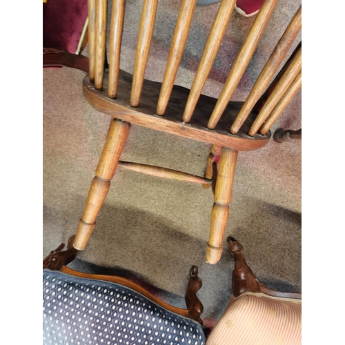 666 - An early stick back Windsor chair ( having metal bracket repair)