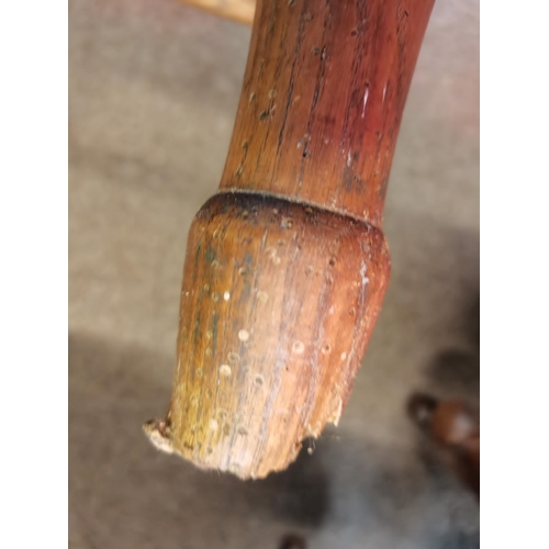 666 - An early stick back Windsor chair ( having metal bracket repair)