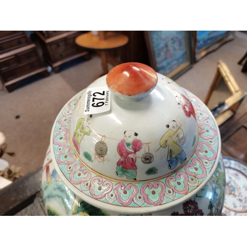 672 - A good pair of Chinese tea jars 45cm high decorated with trees and people