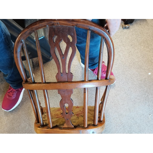 699 - A Childs Windsor chair YEWOOD