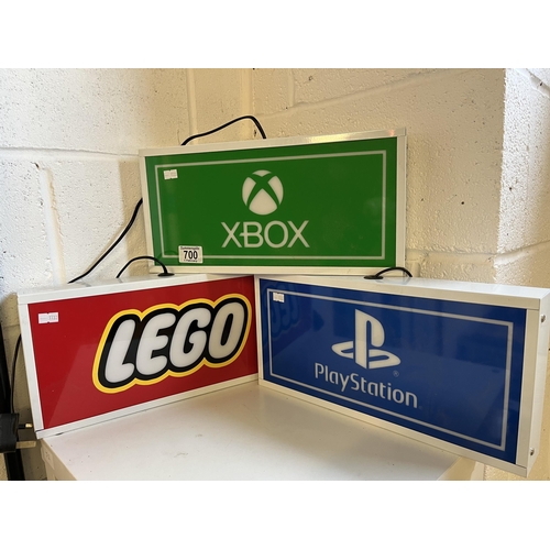 700 - Three illuminated box game signs, for LEGO, XBOX and PlayStation. (3) Approx. 18.5cm high, 37.5cm wi... 