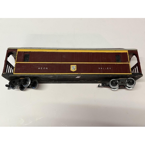 796 - Five wooden model Meon Valley railway carriages, in maroon and yellow livery. (5) Largest 50cm long