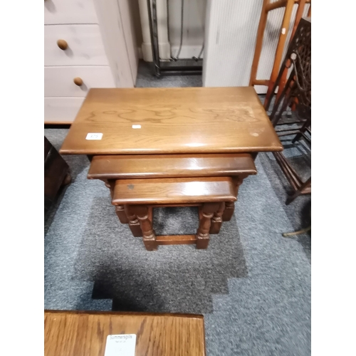 975 - Dark oak nest of tables (x3 ) plus magazine rack table