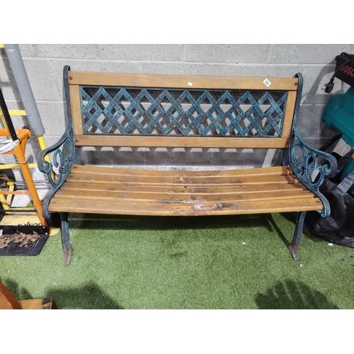 986 - Cast Iron and wooden garden bench - W126cm