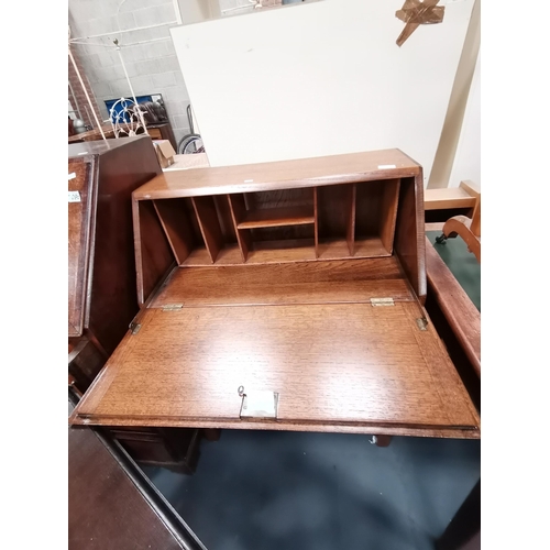 1095 - Oak bureau writing desk with key