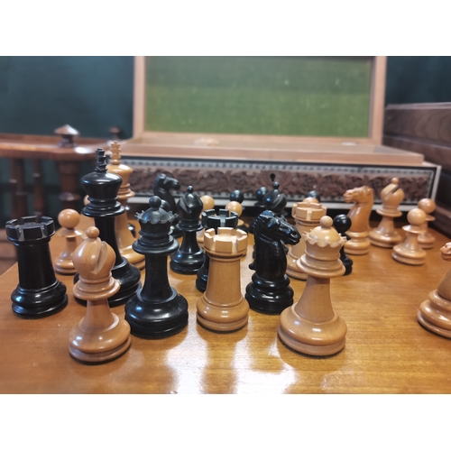 250 - Chess pieces in carved wooden box height of king 7.5cm weight of chess pieces 245grams