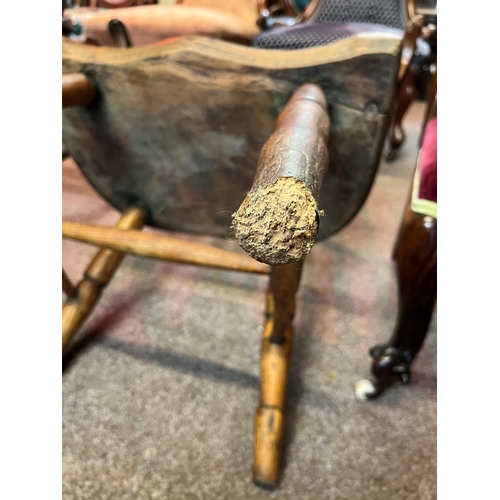 666 - An early stick back Windsor chair ( having metal bracket repair)