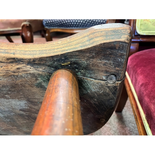 666 - An early stick back Windsor chair ( having metal bracket repair)