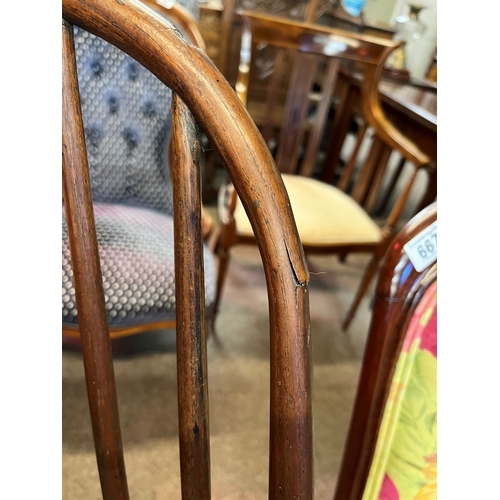 666 - An early stick back Windsor chair ( having metal bracket repair)