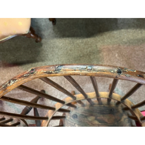 666 - An early stick back Windsor chair ( having metal bracket repair)