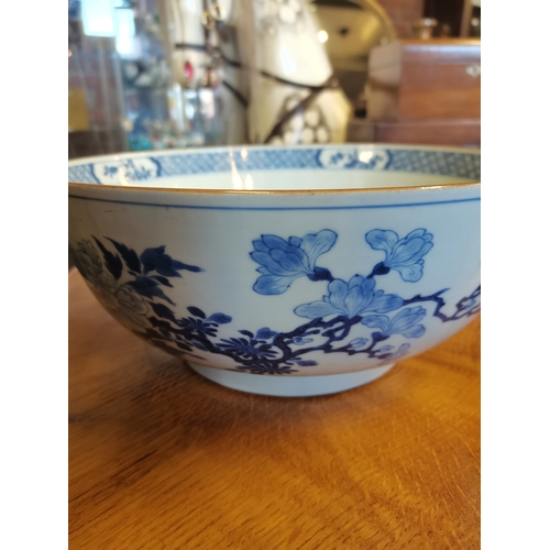 191 - A large blue and white ceramic punch bowl, early 19th Century, decorated in the Chinese taste with f... 