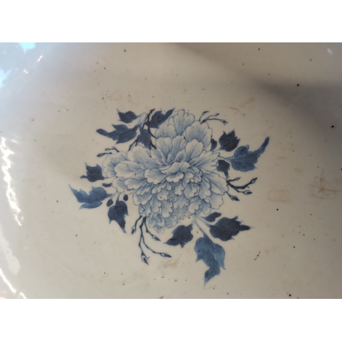 191 - A large blue and white ceramic punch bowl, early 19th Century, decorated in the Chinese taste with f... 