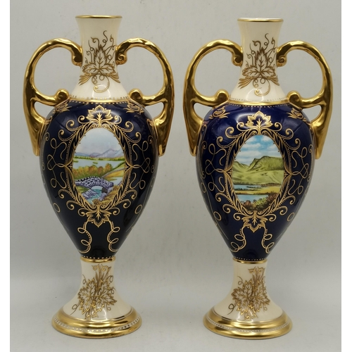 111 - A pair of COALPORT 20cm vases in presentation boxes with countryside scenes to both sides ex. condit... 