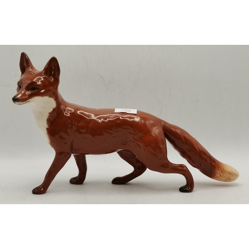 111b - 2 x Beswick foxes