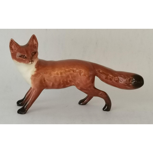 111b - 2 x Beswick foxes