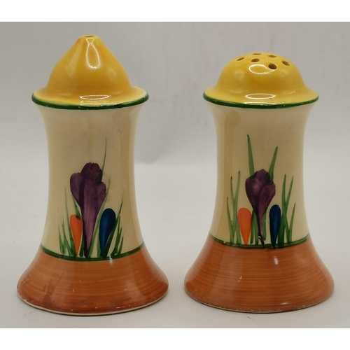 143 - Clarice Cliff: A group of Bizarre wares, all hand-decorated in the Crocus pattern, comprising a salt... 