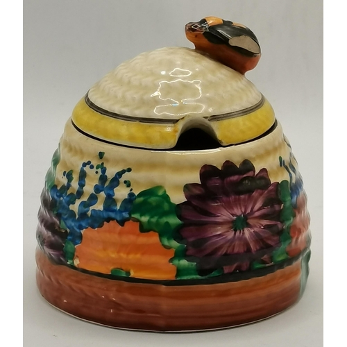 144 - Clarice Cliff: Two Bizarre beehive honey pots, one Gayday pattern, the other with an orange, black a... 