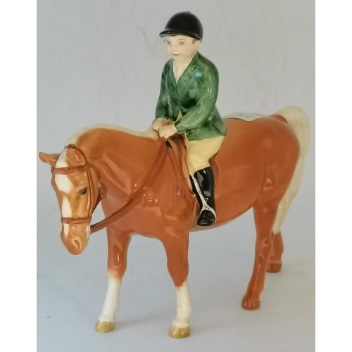 167 - Two Beswick horse models, comprising Boy on Pony, model no. 1500, palomino gloss; and 'Bahram' Arab ... 