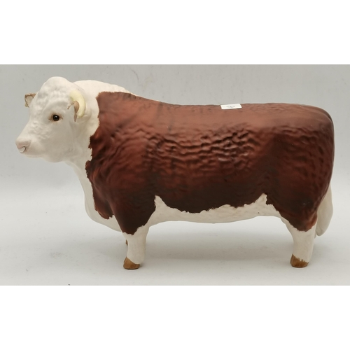 168 - A Beswick Hereford Bull 'Ch. of Champions', model no. 1363A, matt; together with a Beswick Guernsey ... 