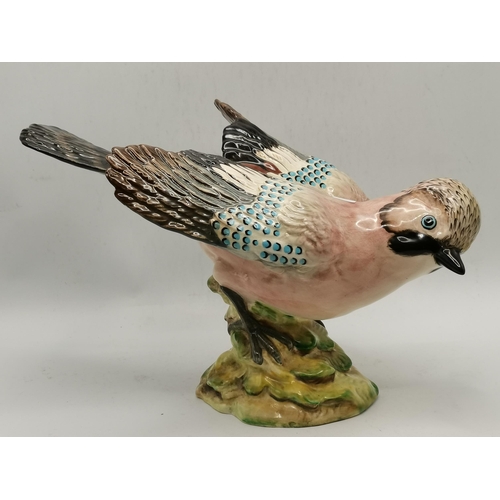 171 - Two Beswick bird models comprising Jay, model no. 1219, and Lesser Spotted Woodpecker, model no. 242... 