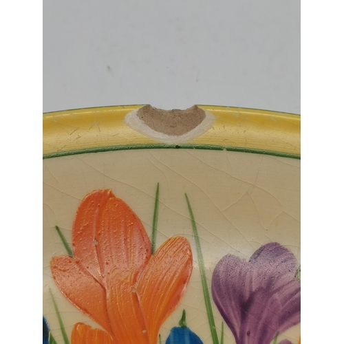 186 - Clarice Cliff: A collection of Bizarre wares, all hand-decorated in the Crocus pattern, comprising a... 