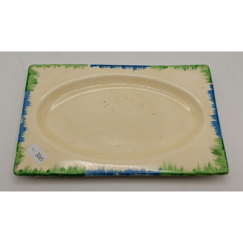 187 - Clarice Cliff: A Bizarre plate, 'The Biarritz', narrow rectangular with blue and green decorated edg... 