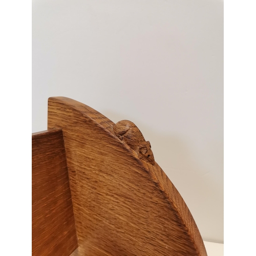 200B - Robert Thompson, a Mouseman oak book trough, of typical form, the ends lightly adzed, with carved mo... 