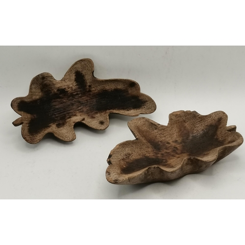 201 - Yorkshire Oak, a pair of carved oak leaf pin dishes. (2) 14.5cm long  (Mouseman interest)