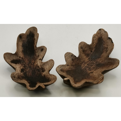 201 - Yorkshire Oak, a pair of carved oak leaf pin dishes. (2) 14.5cm long  (Mouseman interest)