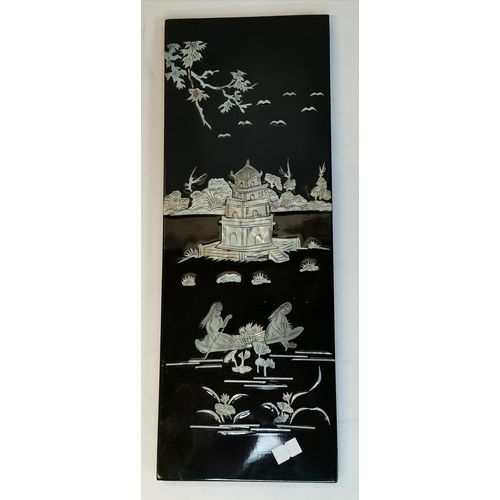 29 - Four oriental black lacquered and mother-of-pearl decorated wooden panels, depicting boating figures... 