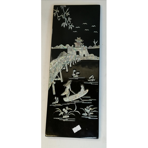 29 - Four oriental black lacquered and mother-of-pearl decorated wooden panels, depicting boating figures... 