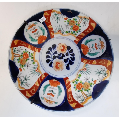 32 - A large Japanese Imari charger, impressed character mark to base; together with another smaller Imar... 