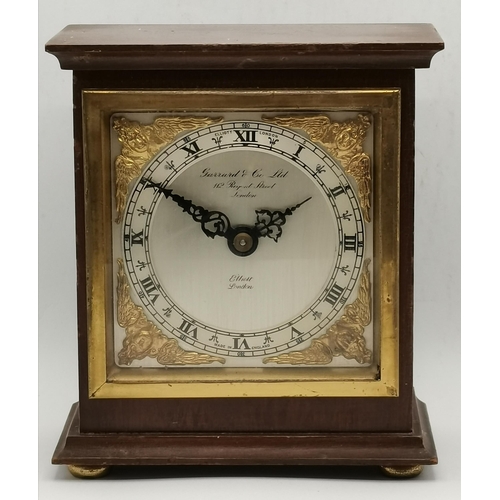 70 - A Garrard & Co Ltd mantel clock by Elliott, London, with presentation inscription plaque dated 1985 ... 