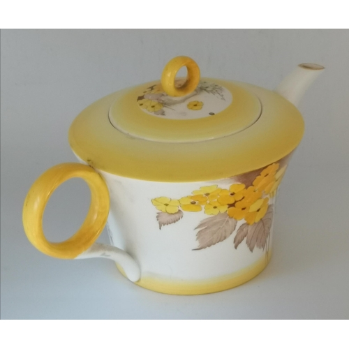 72 - A Shelley 'Phlox' teapot, in yellow, pattern no. W12190. 22cm handle to spout