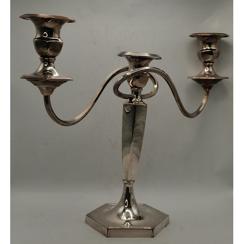 300 - A George V silver candlestick by John & William F Deakin, Chester 1918, the tapering octagonal stem ... 