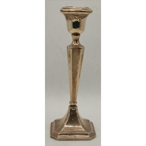 300 - A George V silver candlestick by John & William F Deakin, Chester 1918, the tapering octagonal stem ... 