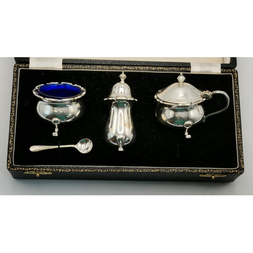 306 - A group of assorted silver-plate and pewter, comprising a silver-plated cruet set by Adie Brothers L... 